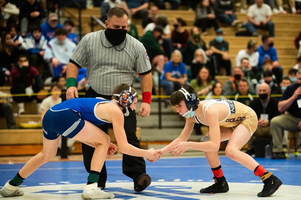 Valley Central's Luke Satriano, left, wrestles Newburgh's Cooper Merli, right, in the 102-pound category during the Section 9 Division 1 wrestling championships at Monroe-Woodbury High School in Central Valley on Saturday, February 12, 2022.