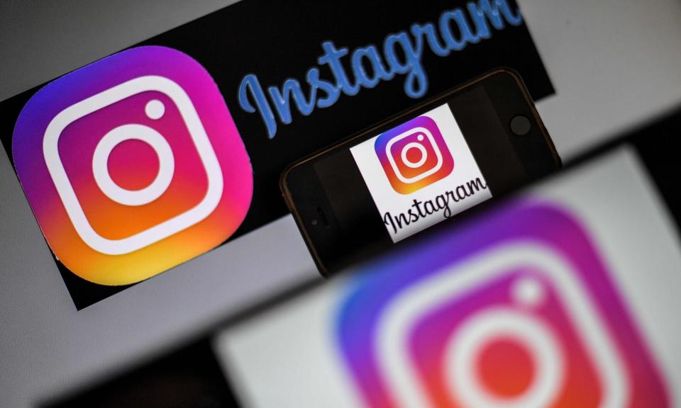 <span>Instagram added the short-form video feature Reels in a direct challenge to TikTok.</span><span>Photograph: Loïc Venance/AFP/Getty Images</span>