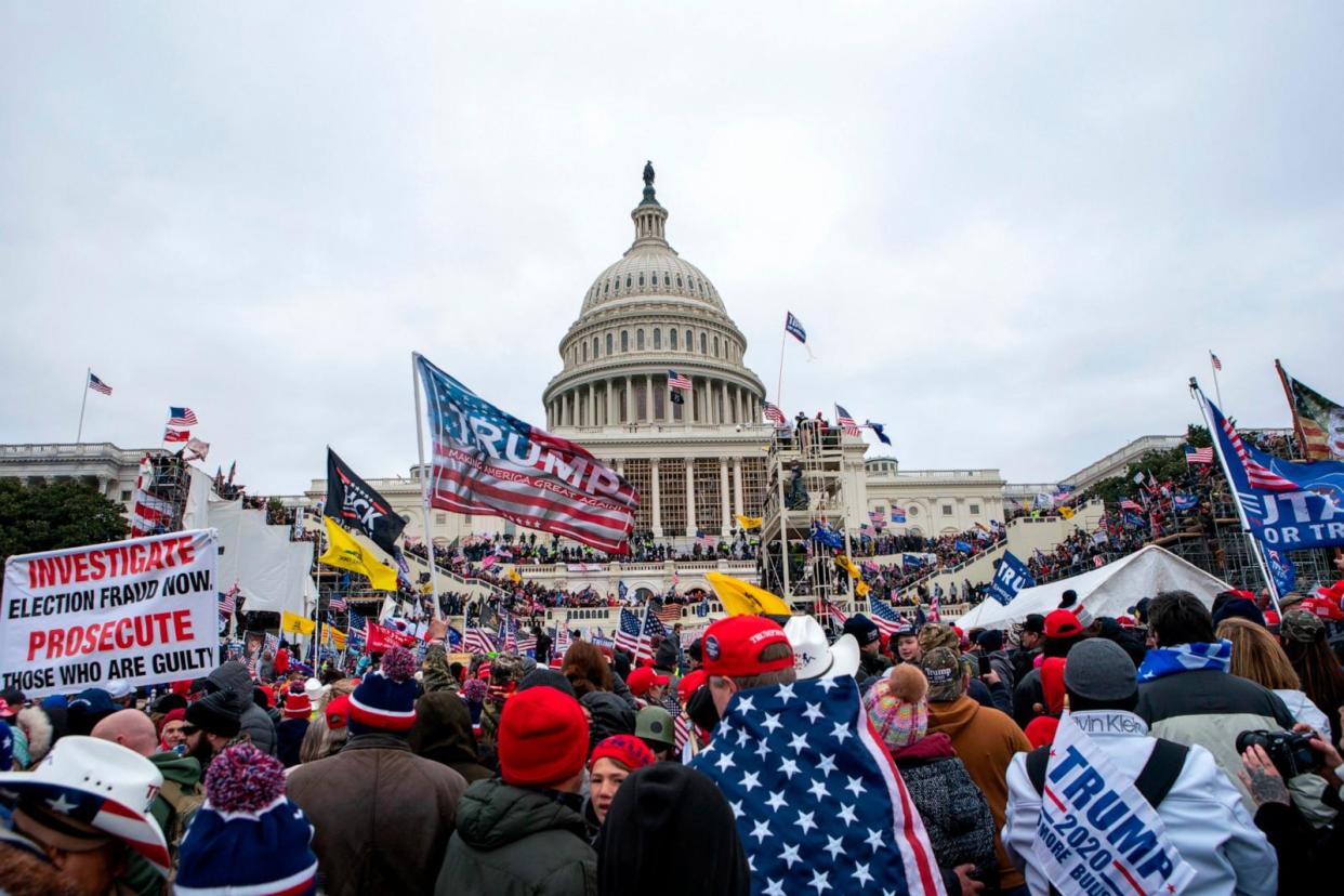 PHOTO: Rioters loyal to President Donald Trump rally at the U.S. Capitol in Washington on Jan. 6, 2021. (Jose Luis Magana/AP, FILE)