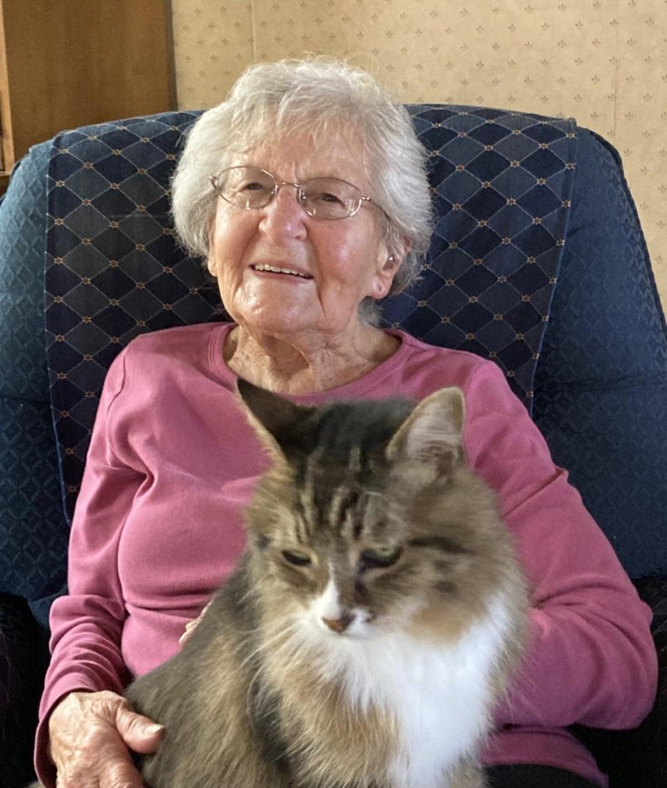 Jean Marshall relaxing at home with her companion Piga.