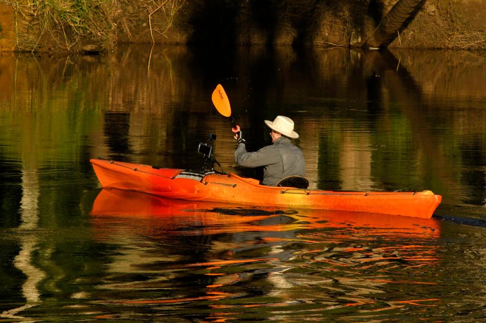 A late afternoon kayaker at Turkey Creek Sanctuary Park, located at 1518 Port Malabar Blvd. in Palm Bay. Established in 1981, this 130 acre location features 1.85 miles of boardwalk,1.5 miles of jogging trails, bike trails, and can be accessed by canoe or kayak.