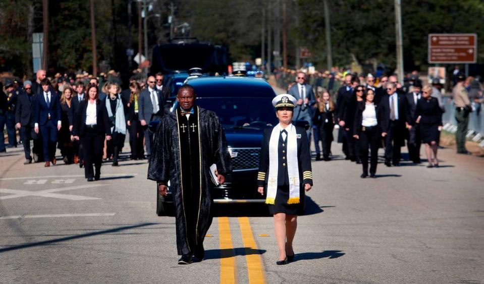 After leaving Maranatha Baptist Church in Plains, Georgia, the funeral procession for Rosalynn Carter approaches Church Street( Highway 280). 11/29/2023 Mike Haskey/mhaskey@ledger-enquirer.com