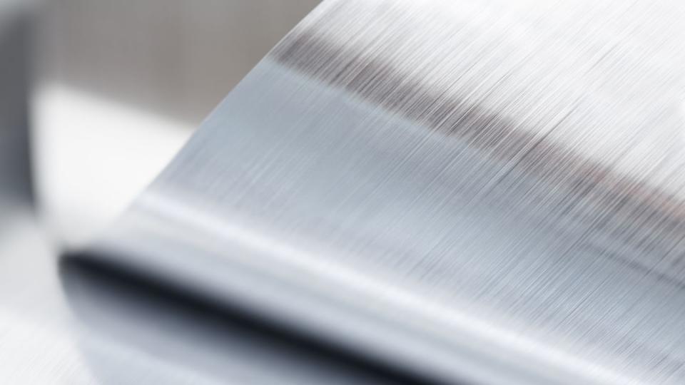 close up of a metallic sheet that is rolled up