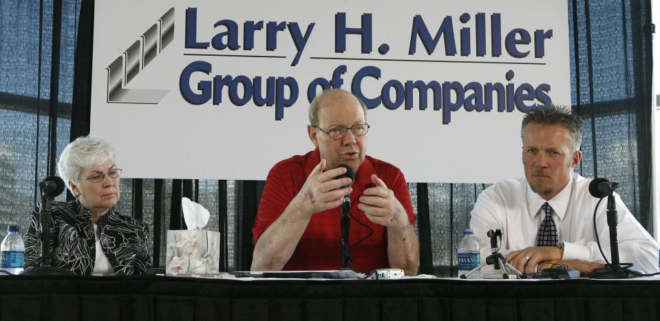 Larry H. Miller talks at a press conference after being released from a long stay in the hospital fighting numerous health problems in Salt Lake City on Aug. 8, 2008. His wife, Gail, and son, Greg, are seated next to him. | Tom Smart, Deseret News