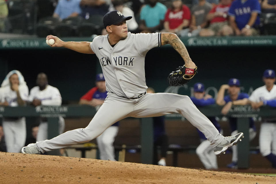 New York Yankees closing pitcher Jonathan Loaisiga throws during the ninth inning in the first baseball game of a doubleheader against the Texas Rangers in Arlington, Texas, Tuesday, Oct. 4, 2022. The Yankees won 5-4. (AP Photo/LM Otero)