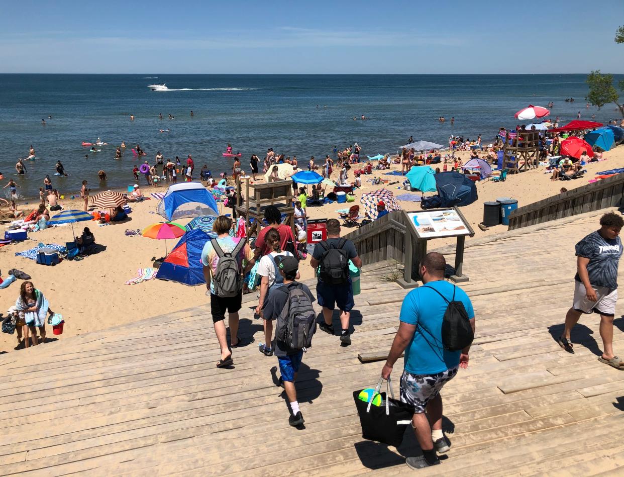 Beach goers fill the popular West Beach in the Indiana Dunes National Park near Gary in the summer of 2020.