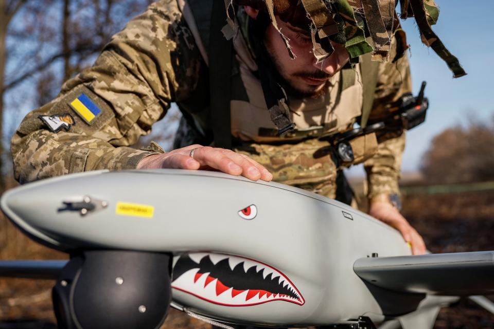 A Ukrainian soldier checks a Shark drone before launching it amid fighting in Kharkiv, Ukraine (REUTERS)
