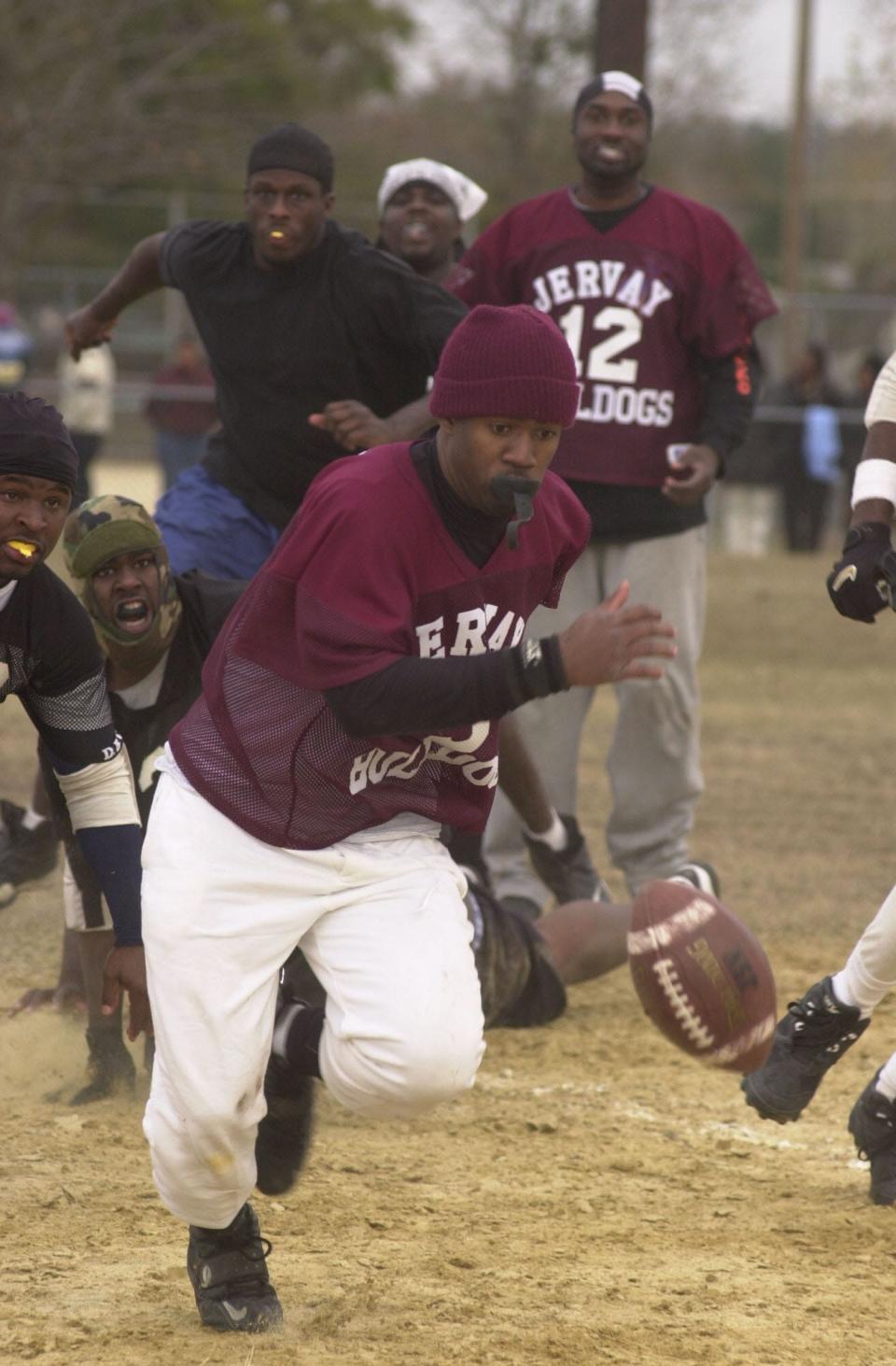 Jervay's Ke Ke Brown looks to recover a fumble during the Turkey Bowl in 2003.