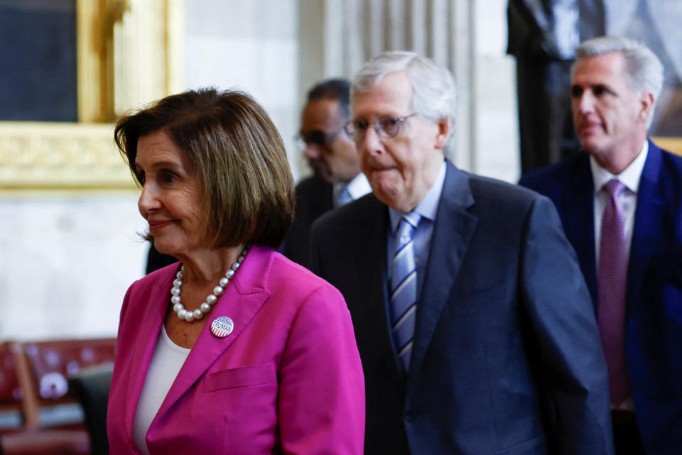 House Speaker Nancy Pelosi (D-CA), Senate Minority Leader Mitch McConnell (R-KY) and House Minority Leader Kevin McCarthy (R-CA) depart the unveiling of the Harry Truman statue at the U.S. Capitol rotunda in Washington, September 29, 2022. REUTERS/Evelyn Hockstein