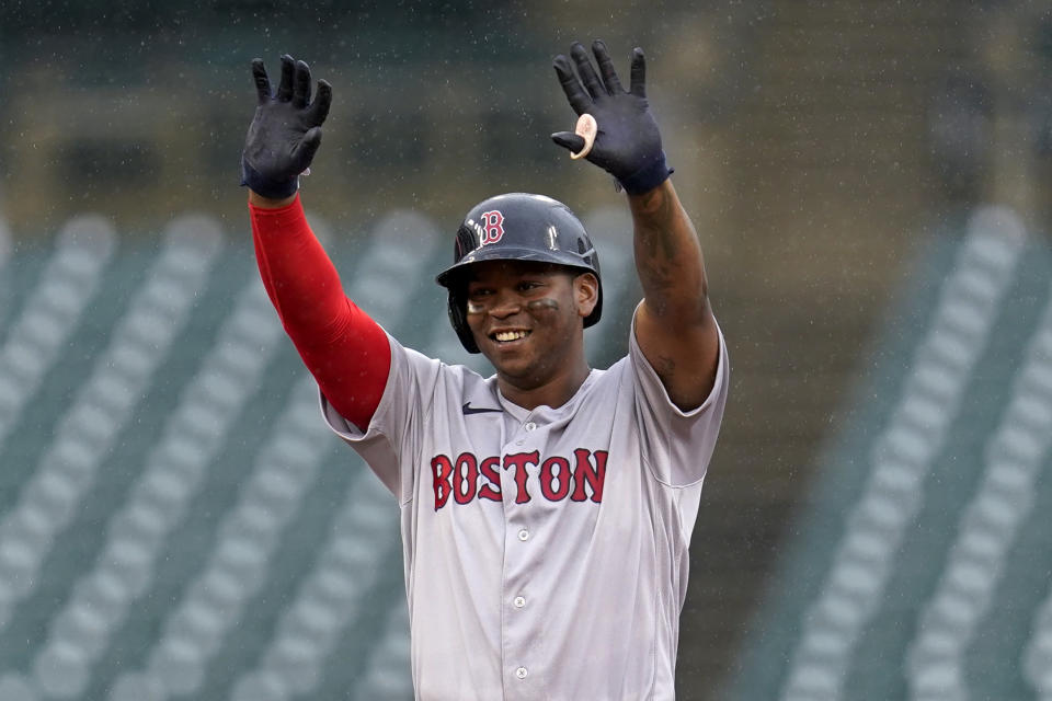 Boston Red Sox's Rafael Devers reacts to his one run double against the Detroit Tigers in the fourth inning of a baseball game in Detroit, Wednesday, April 13, 2022. (AP Photo/Paul Sancya)
