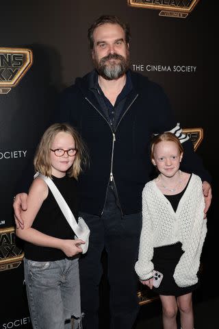 <p>Jamie McCarthy/Getty</p> David Harbour and stepdaughters Ethel Mary (L) and Marnie Rose (R)