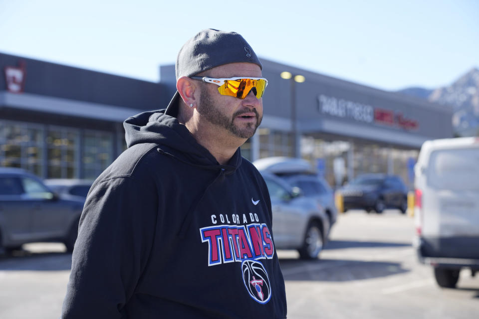 Robert Olds, the uncle of one of the 10 people killed in a shooting in a grocery store on March 22, 2021, speaks outside the renovated King Soopers after taking part in a tour for victims' families to see the site Tuesday, Feb. 8, 2022, in Boulder, Colo. The store will reopen to the public on Wednesday, Feb. 9, after major renovations. (AP Photo/David Zalubowski)