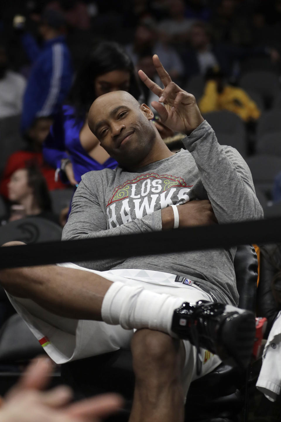 Atlanta Hawks guard Vince Carter (15) sits on the bench in the final seconds of an NBA basketball game against the New York Knicks Wednesday, March 11, 2020, in Atlanta. (AP Photo/John Bazemore)