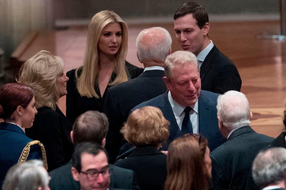 Former US Vice President Joe Biden, and his wife Jill Biden speak with Ivanka Trump, the daughter of President Donald Trump and her husband, President Donald Trump's White House Senior Adviser Jared Kushner, as former US Vice President Al Gore, speaks to former US President Jimmy Carter(R) and former first lady Rosalynn Carter before a State Funeral for former US President George H.W. Bush at the National Cathedral, December 5, 2018,  in Washington,DC.