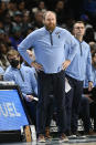 Memphis Grizzlies head coach Taylor Jenkins watches his team play against the Detroit Pistons during the second half of an NBA basketball game, Sunday, Dec. 4, 2022, in Detroit. (AP Photo/Jose Juarez)