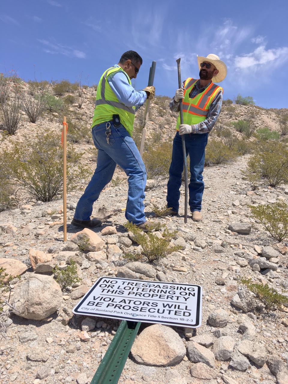 The United Constitutional Patriots-New Mexico Border Ops group were visited by law enforcement Monday as they erected 'No Trespassing' signs denoting the city of Sunland Park's boundary near their camp. Union Pacific Police said they are camped on railroad land and will need to vacate by Friday.