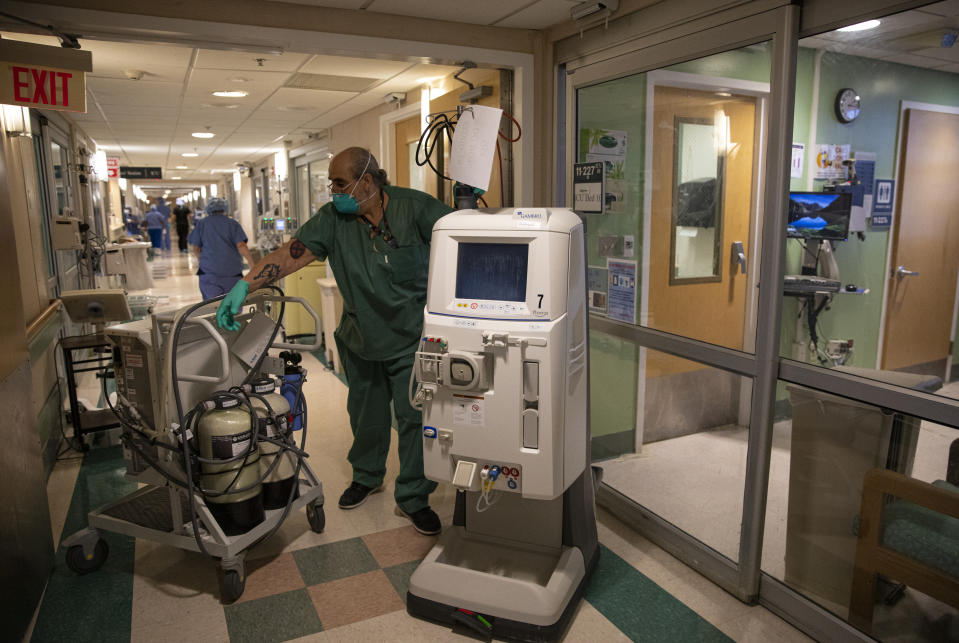 NEW YORK, NY - APRIL 21:  A portable kidney dialysis machine is moved by a hospital staff member on the Intensive Care Unit (ICU) floor at the Veterans Affairs Medical Center on April 21, 2020 in the Brooklyn borough of New York City. The Department of Veteran Affairs announced it was assisting New York City by admitting civilians suffering from COVID-19 in its Manhattan and Fort Hamilton, Brooklyn hospital facilities. New York City remains the epicenter of the coronavirus pandemic in the United States. (Photo by Robert Nickelsberg/Getty Images)