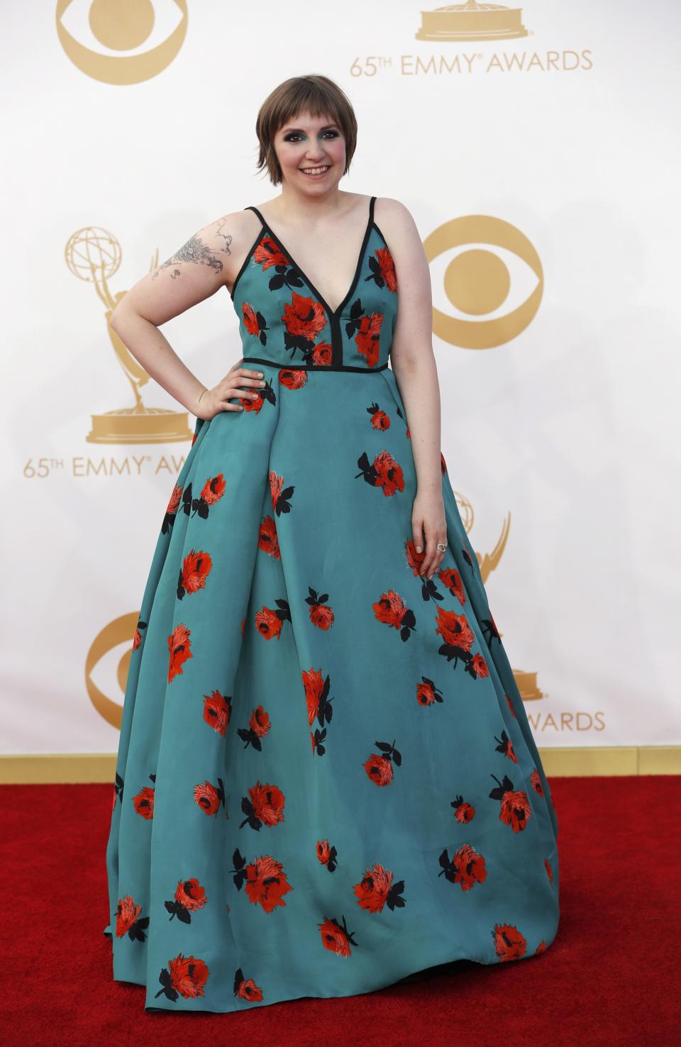 Actress Lena Dunham from HBO's series "Girls" arrives at the 65th Primetime Emmy Awards in Los Angeles September 22, 2013. REUTERS/Mario Anzuoni (UNITED STATES Tags: ENTERTAINMENT) (EMMYS-ARRIVALS)