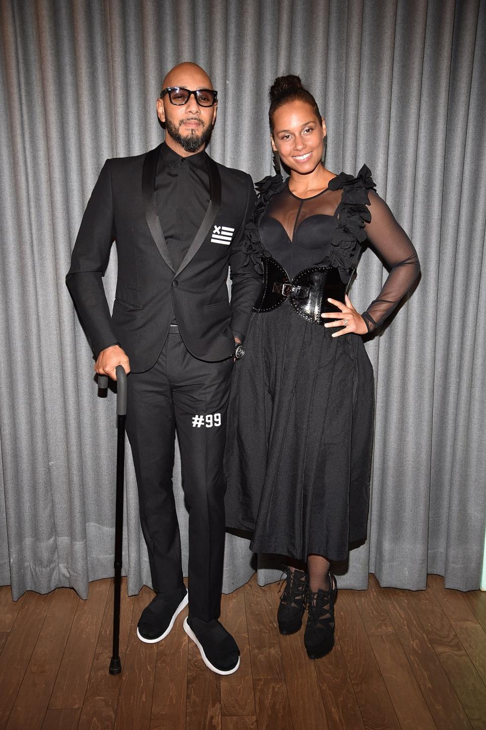 <p>Singer Alicia Keys and her husband, Swizz Beatz, both wore black glam looks to the 2017 Brooklyn Artists Ball on April 3. (Photo: Getty Images) </p>