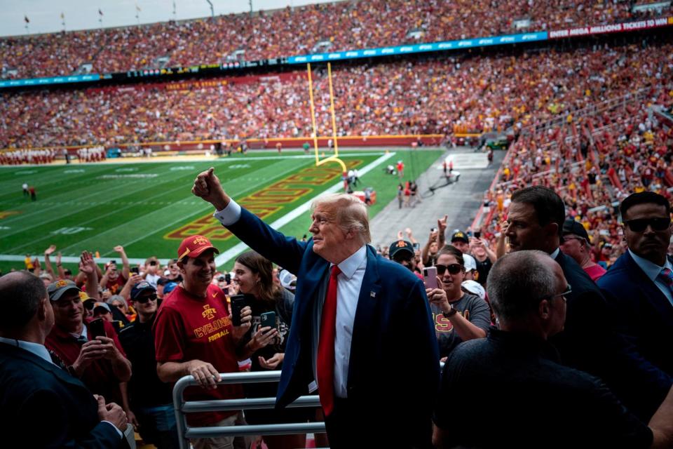 PHOTO: In this Sept. 9, 2023, file photo, former President Donald Trump waves to the crowds before the start of a NCAA college football game between Iowa State University and the University of Iowa at Jack Trice Stadium in Ames, Iowa. (The Washington Post via Getty Images, FILE)