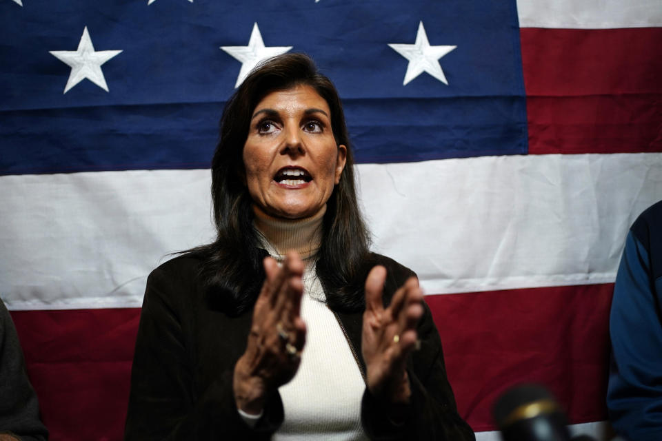 Republican presidential candidate former U.N. Ambassador Nikki Haley speaks to reporters following a town hall campaign event, Tuesday, Dec. 12, 2023, in Manchester, N.H. (AP Photo/Robert F. Bukaty)