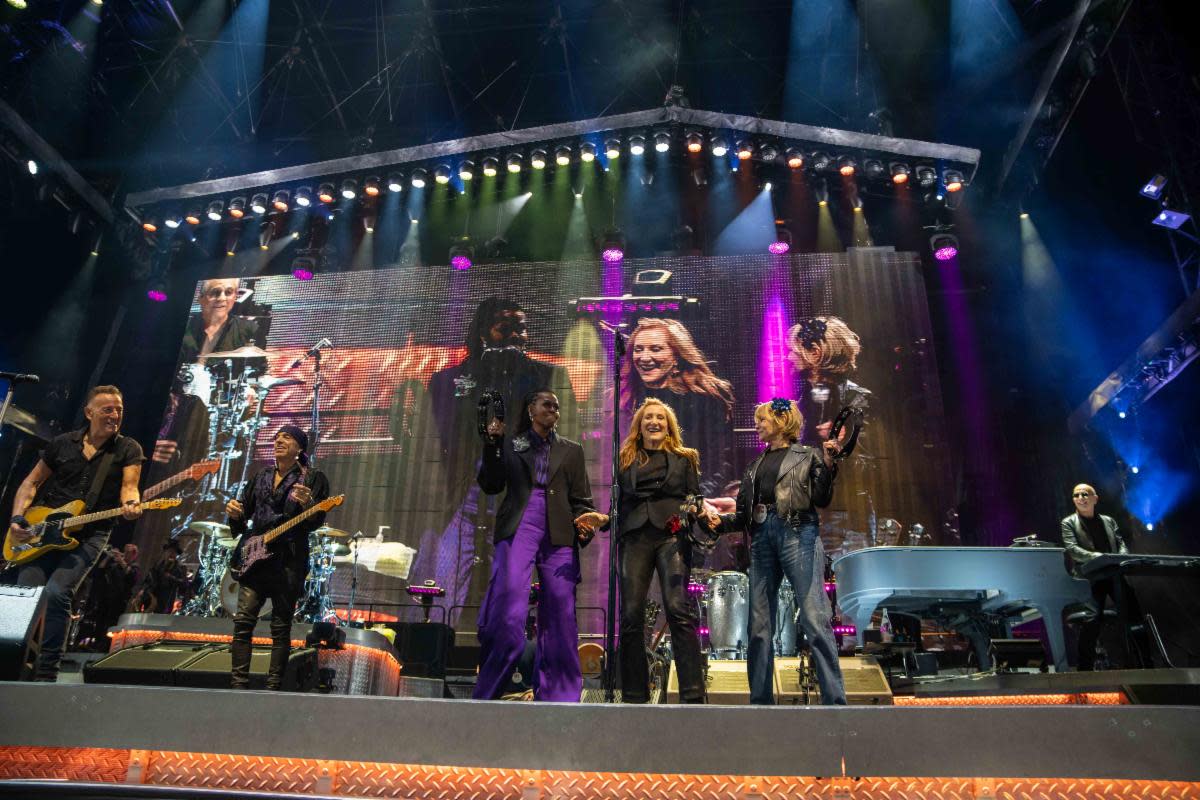 Bruce Springsteen (L-R), Steven Van Zandt, Michelle Obama, Patti Scialfa, Kate Capshaw and Roy Bittan at the April  28 E Street Band show at the Lluis Companys Olympic Stadium in Barcelona, Spain.