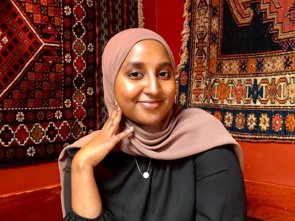 Aisha Ali is a board member with Sisters Dialogue, the organization that launched Edmonton SafeWalk. The initiative aims to help Black Muslim women walk in the city with a volunteer in order to feel safe.  (Submitted by Aisha Ali - image credit)