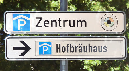 A sign leading to Munich's famous Hofbraeuhaus Restaurant and beer pub in Munich, Germany August 18, 2017. REUTERS/Michael Dalder