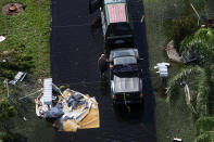 A man stands in a flooded street after Hurricane Ian caused widespread destruction in Punta Gorda, Florida, U.S., September 29, 2022. REUTERS/Shannon Stapleton