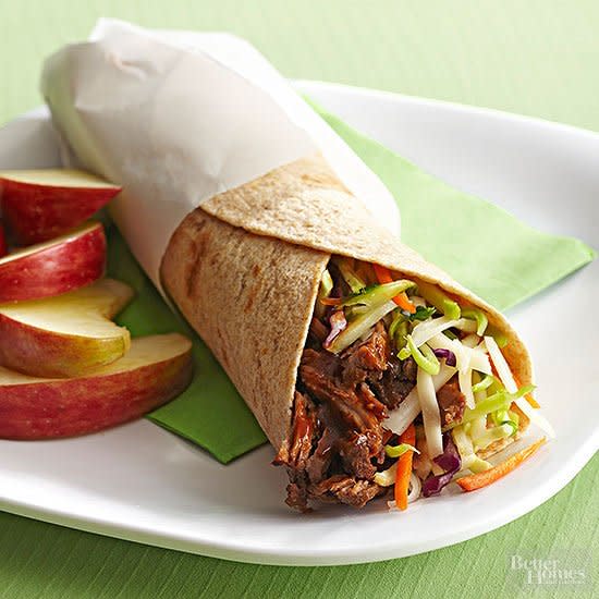 Bust loose from you turkey-sandwich rut right now with our creative wrap recipes! Here, you’ll find your next favorite beef, pork, or chicken wrap recipe, plus tuna and veggie wrap recipes, too. But before you unwrap your midday masterpiece, better copy this link: The colorful combo might create lunch envy among your coworkers, so be prepared to share these clever lunch wrap ideas with everyone.