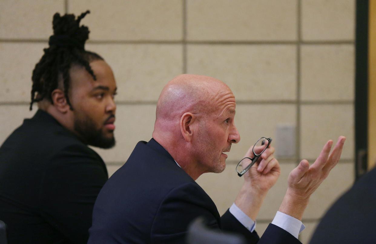 Defense attorney Van Plumb argues as former Iowa State defensive end Eyioma Uwazurike listens during the motion to dismiss hearing at Story County Courthouse on Friday, Oct. 20, 2023, in Nevada, Iowa.