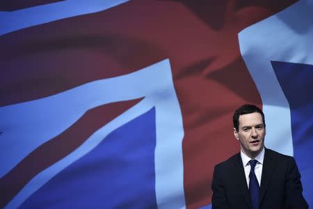 Britain's Chancellor of the Exchequer George Osborne speaks before the launch of the Conservative Party's manifesto in Swindon, western England, April 14, 2015. REUTERS/Toby Melville