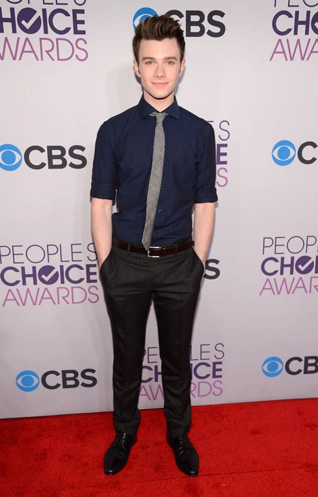 BEST: Chris Colfer.  The "Glee" star proves you don't need a tux to be suave wearing a navy shirt, charcoal pinstripe trousers, and super skinny gray tie.