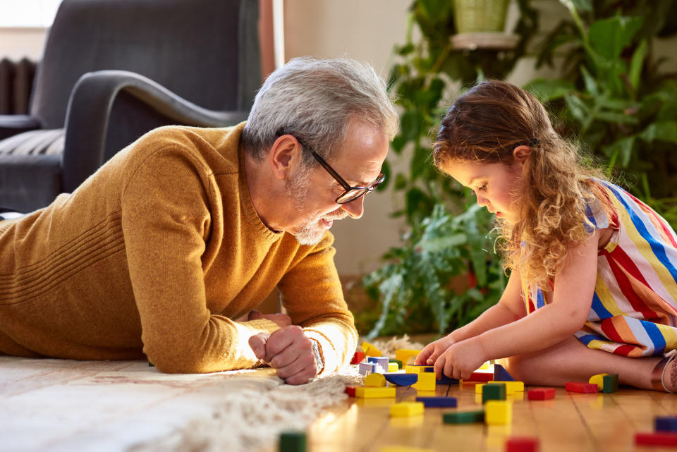 grandfather and grandkid doing blocks together