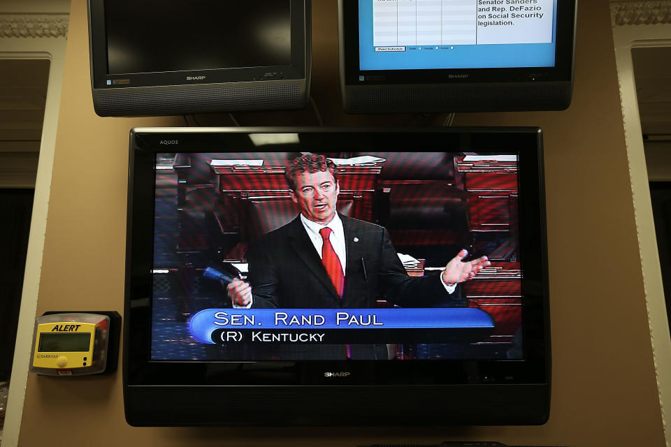 WASHINGTON, DC - MARCH 06:  U.S. Sen. Rand Paul (R-KY) is seen on a TV monitor as he participates in a filibuster on the Senate floor March 6, 2013 on Capitol Hill in Washington, DC. Paul is filibustering the Senate to oppose the nomination of John Brennan to be the next director of CIA.  (Photo by Alex Wong/Getty Images)