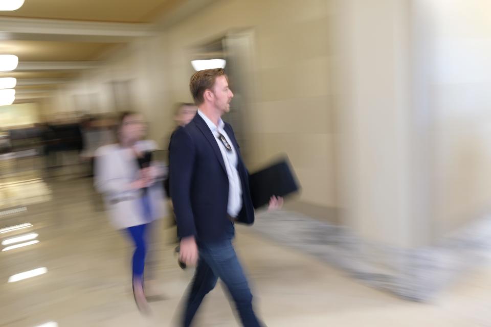 State superintendent Ryan Walters arrives for a media event to discuss the teacher bonus program at the Oklahoma Capitol, Wednesday, Jan. 31, 2024.