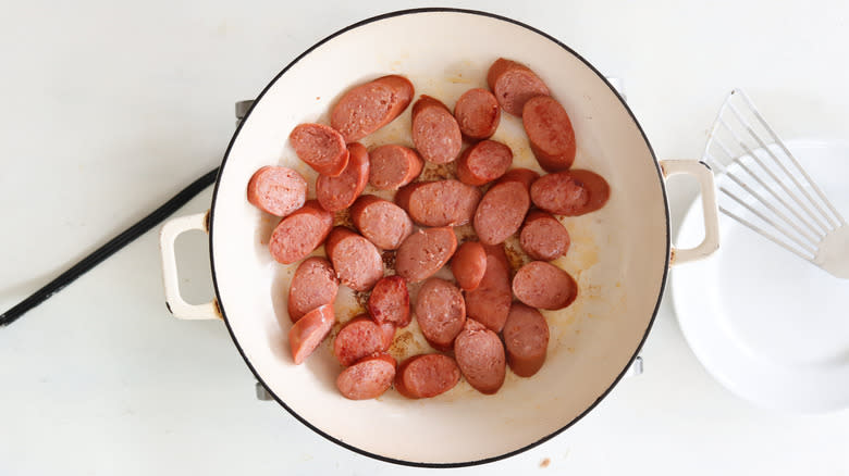 browned sausage in a pan