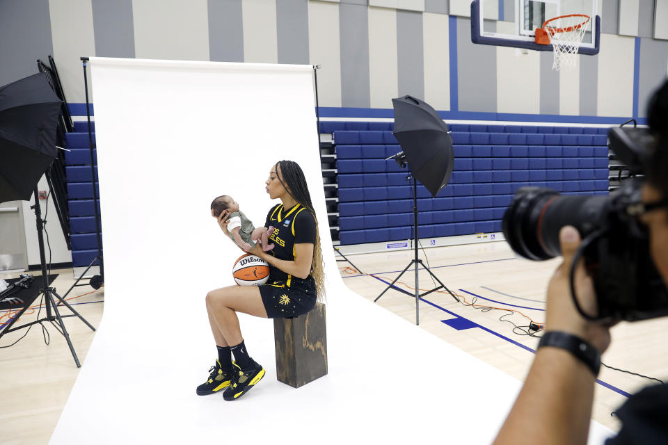 Dearica Hamby with her son, Legend, during the Los Angeles Sparks' media day on May 4, 2023. (Christina House / Los Angeles Times via Getty Images)