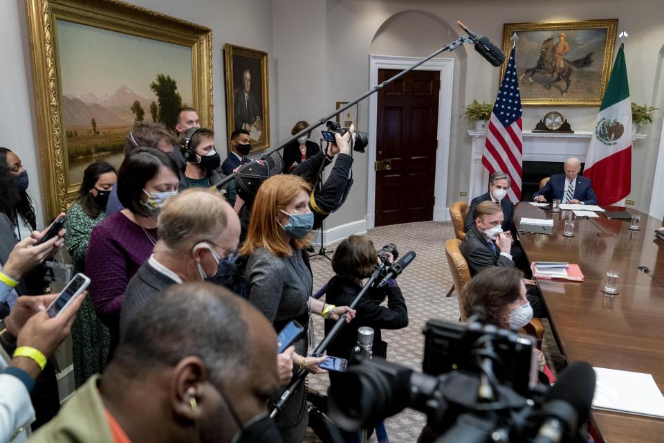 President Joe Biden, right, attends a virtual meeting with Mexican President Andres Manuel Lopez Obrador in the Roosevelt Room of the White House, Monday, March 1, 2021, in Washington. Also pictured is Secretary of State Antony Blinken, second from right, and White House national security adviser Jake Sullivan, third from right. (AP Photo/Andrew Harnik)