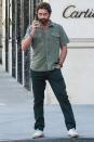 Gerard Butler takes a phone call in L.A. on Wednesday. 