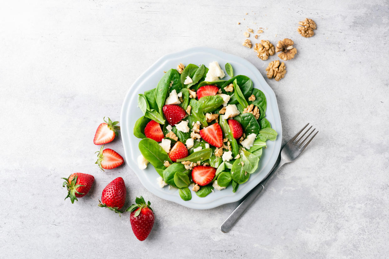 Salad with strawberries, feta cheese and walnuts (Arx0nt / Getty Images stock)