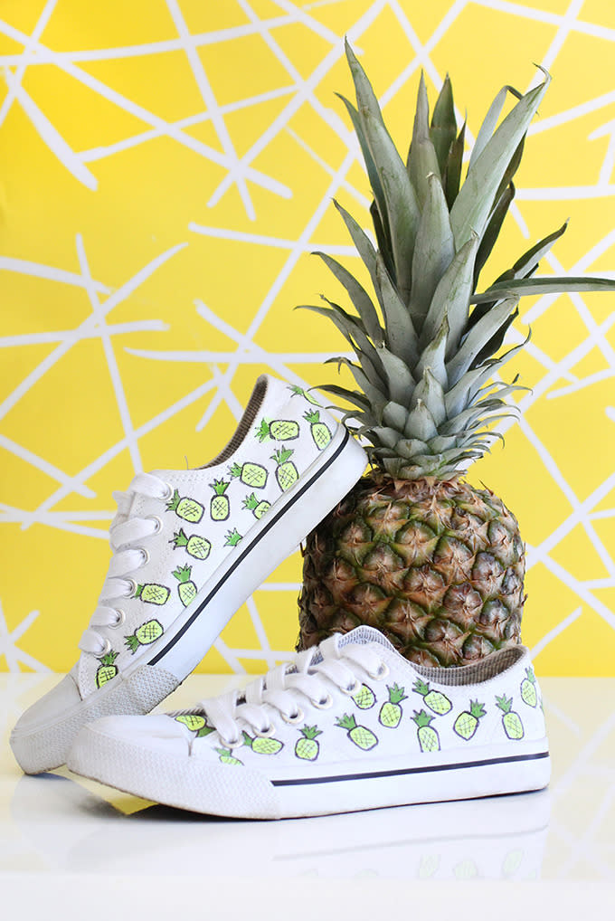 <p>Go pineapple crazy by covering a pair of canvas sneakers with a pineapple design.<i><a href="http://ispydiy.com/2015/07/02/my-diy-pineapple-cotton-canvas-sneakers/" rel="nofollow noopener" target="_blank" data-ylk="slk:[Photo: Pinterest];elm:context_link;itc:0;sec:content-canvas" class="link "> [Photo: Pinterest]</a></i></p>