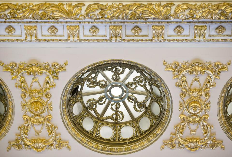 A picture taken on Dec. 12, 2012, shows a ceiling detail at the Parliament Palace in Bucharest, Romania. Twenty-three years after communism collapsed, the Palace of the Parliament, a gargantuan Stalinist symbol and the most concrete legacy of ex-dictator Nicolae Ceausescu, has emerged as an unlikely pillar of Romania's nascent democracy. And while it remains one of the most controversial projects of Ceausescu's 25-year rule, albeit one that has gradually found a place in the nation's psyche, it's also now a tourist attraction, visited by tens of thousands of Romanians and foreigners every year. (AP Photo/Vadim Ghirda)