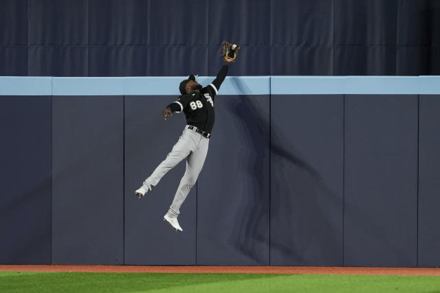 Luis Robert Jr of the Chicago White Sox warms up before playing