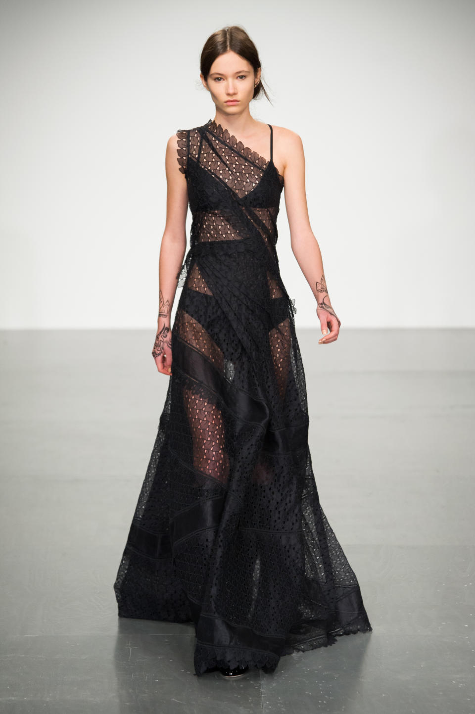<p><i>Black sheer-lace dress from the SS18 Antonio Berardi collection. (Photo: IMAXtree) </i></p>