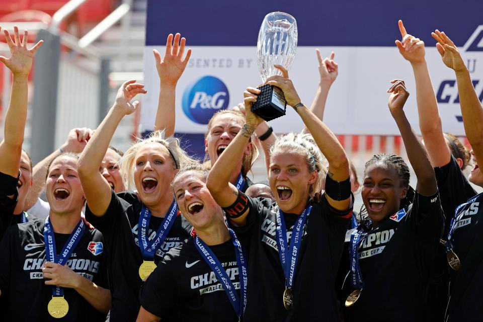 Houston Dash players celebrate after winning the 2020 NWSL Challenge Cup in Sandy, Utah.