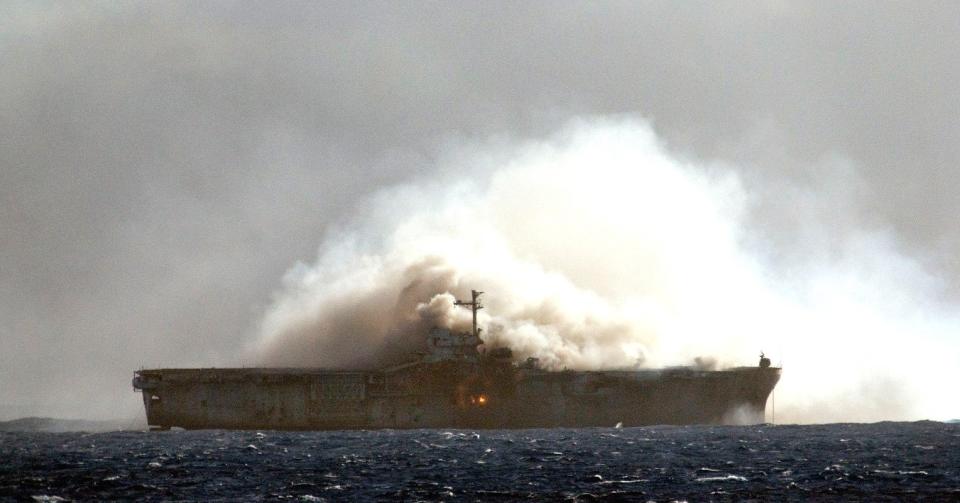 Smoke billows from the former USS <em>New Orleans</em> during RIMPAC 2010's SINKEX. <em>USN</em>