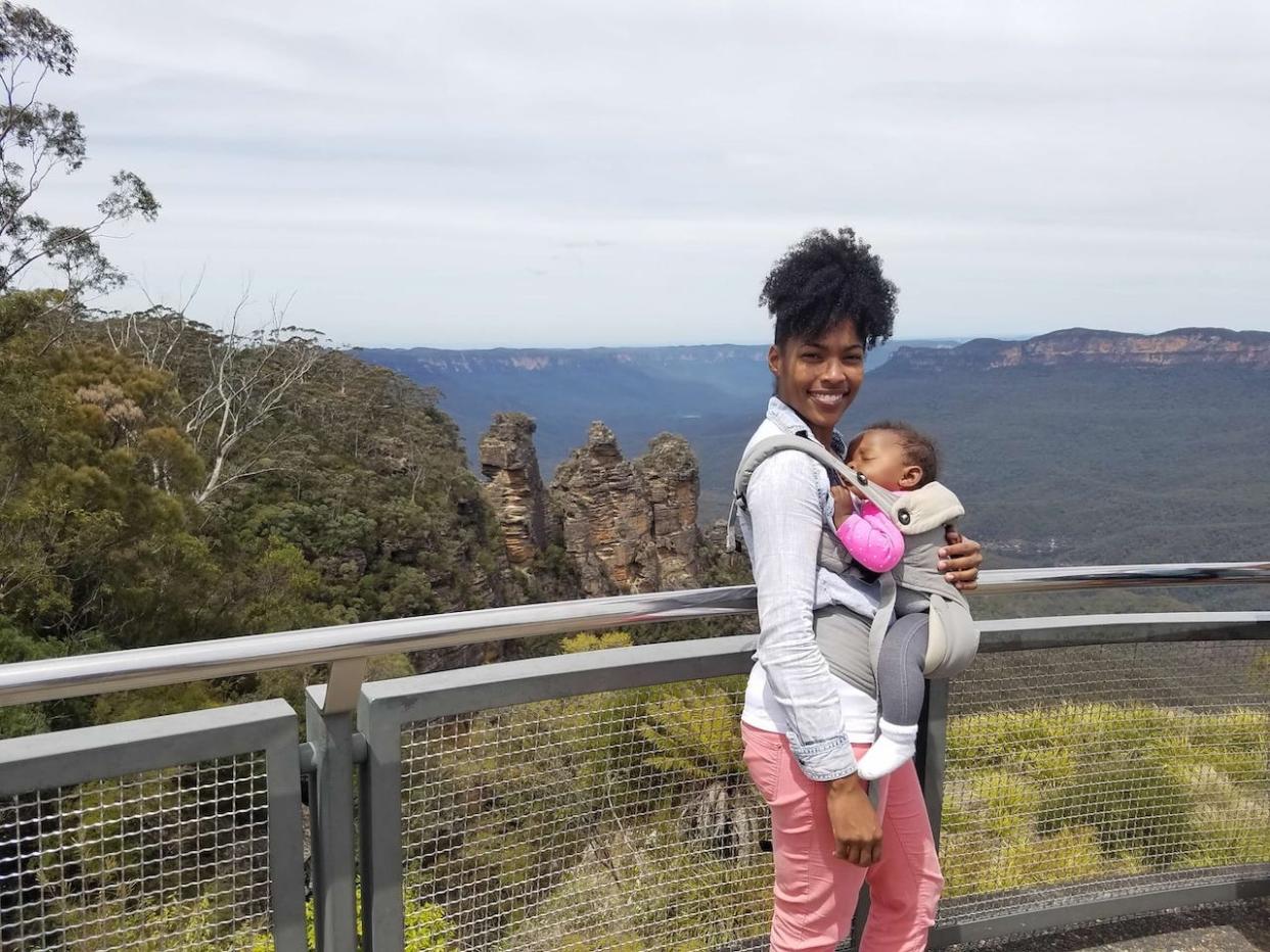 Monet Hambrick and one of her daughters during a trip to Australia.