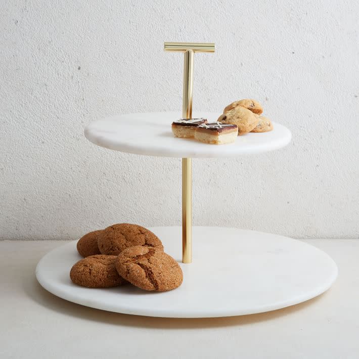 <p><a href="https://go.redirectingat.com?id=74968X1596630&url=https%3A%2F%2Fwww.westelm.com%2Fproducts%2Fmarble-brass-2-tier-cake-stand-e1737%2F%3Fpkey%3Dccake-stands&sref=https%3A%2F%2Fwww.housebeautiful.com%2Fshopping%2Fg60630997%2Fgifts-for-bakers%2F" rel="nofollow noopener" target="_blank" data-ylk="slk:Shop Now;elm:context_link;itc:0;sec:content-canvas" class="link ">Shop Now</a></p><p>Madison Marble & Brass 2-Tier Cake Stand</p><p>west elm</p><p>$50.00</p>