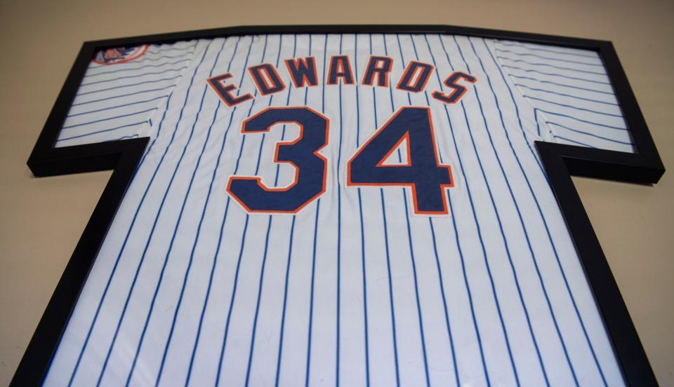 Jeff Edwards’ old baseball jersey is displayed alongside other memorabilia at his home in Mt. Juliet, Tenn., Thursday, March 28, 2024.